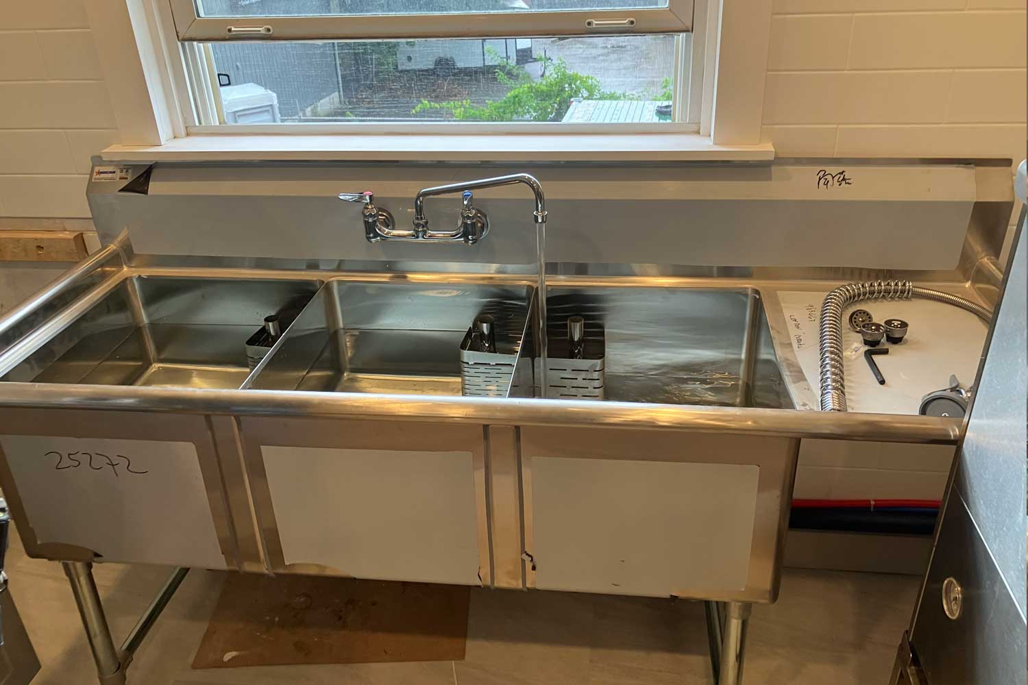 commercial sink in a commercial renovation